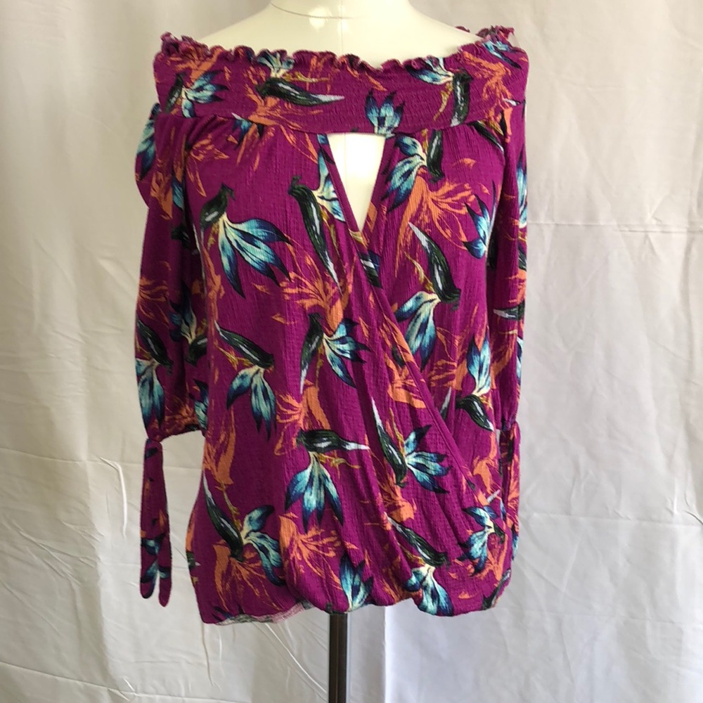 Super cute fuchsia floral shirt. 3/4 sleeve.